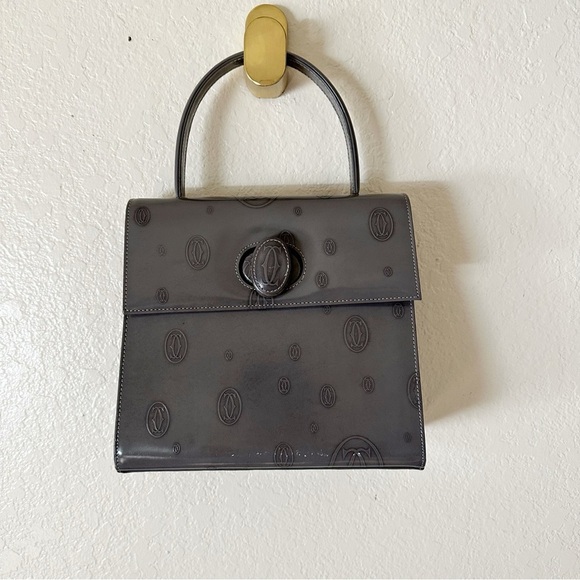 Authentic Cartier Happy Birthday handbag in monogram patent leather